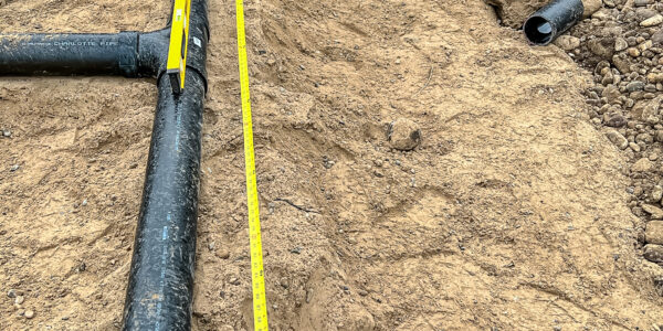 Installing septic pipe